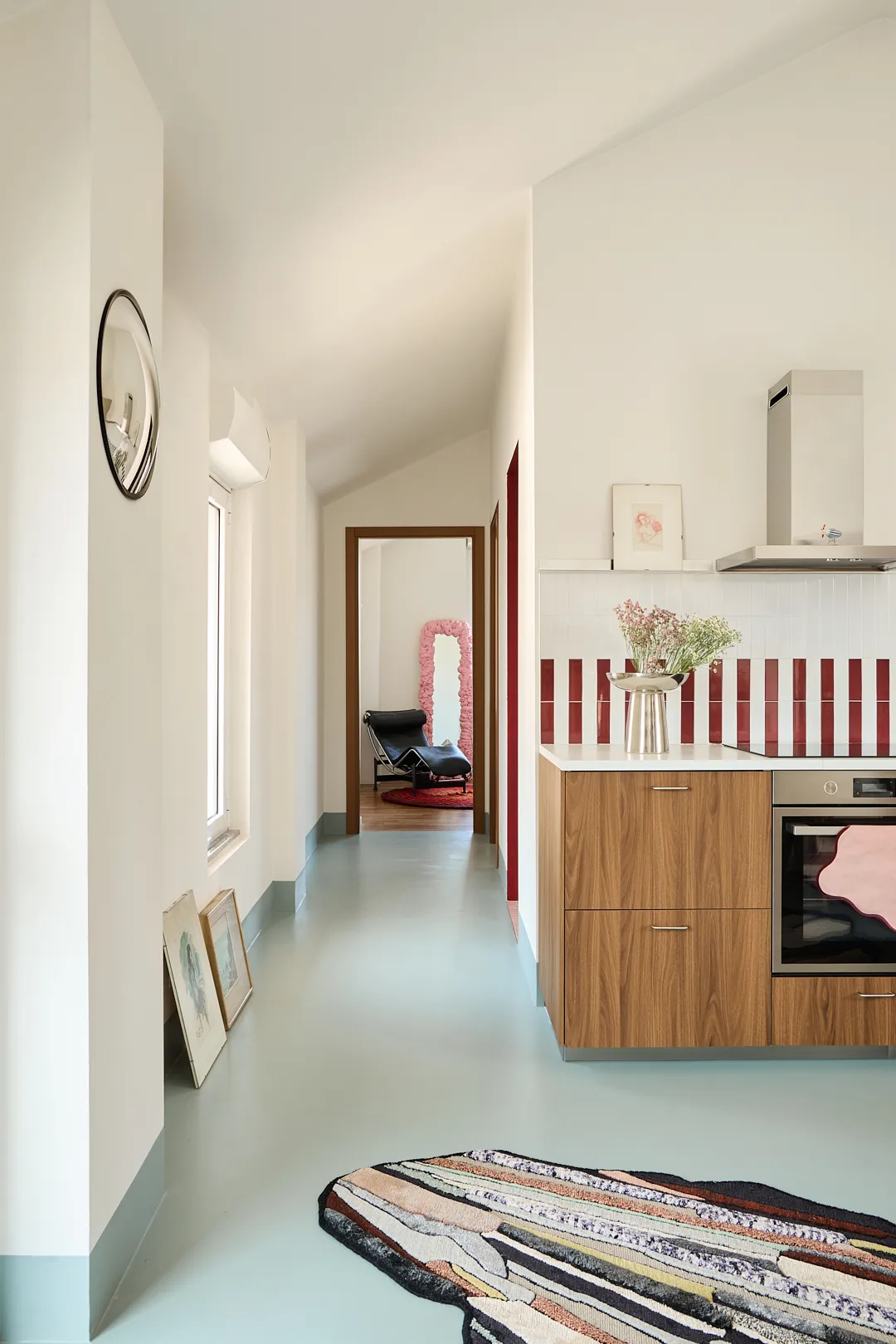A 750-Square-Foot Home Gets a Fresh and Fun Look, Thanks to Colorful Floors and a Pink Bathroom