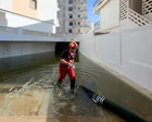 Severe flooding in eastern Spain and UK hit by first named storm of winter